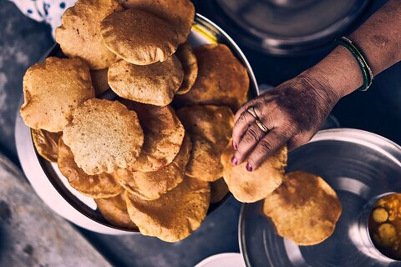 Corsi di cucina tradizionali indiani con la famiglia locale