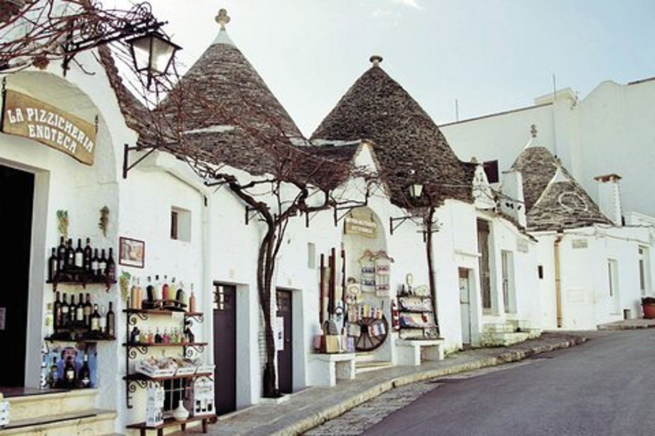 Tour a piedi di Alberobello con audio e guida scritta di un locale