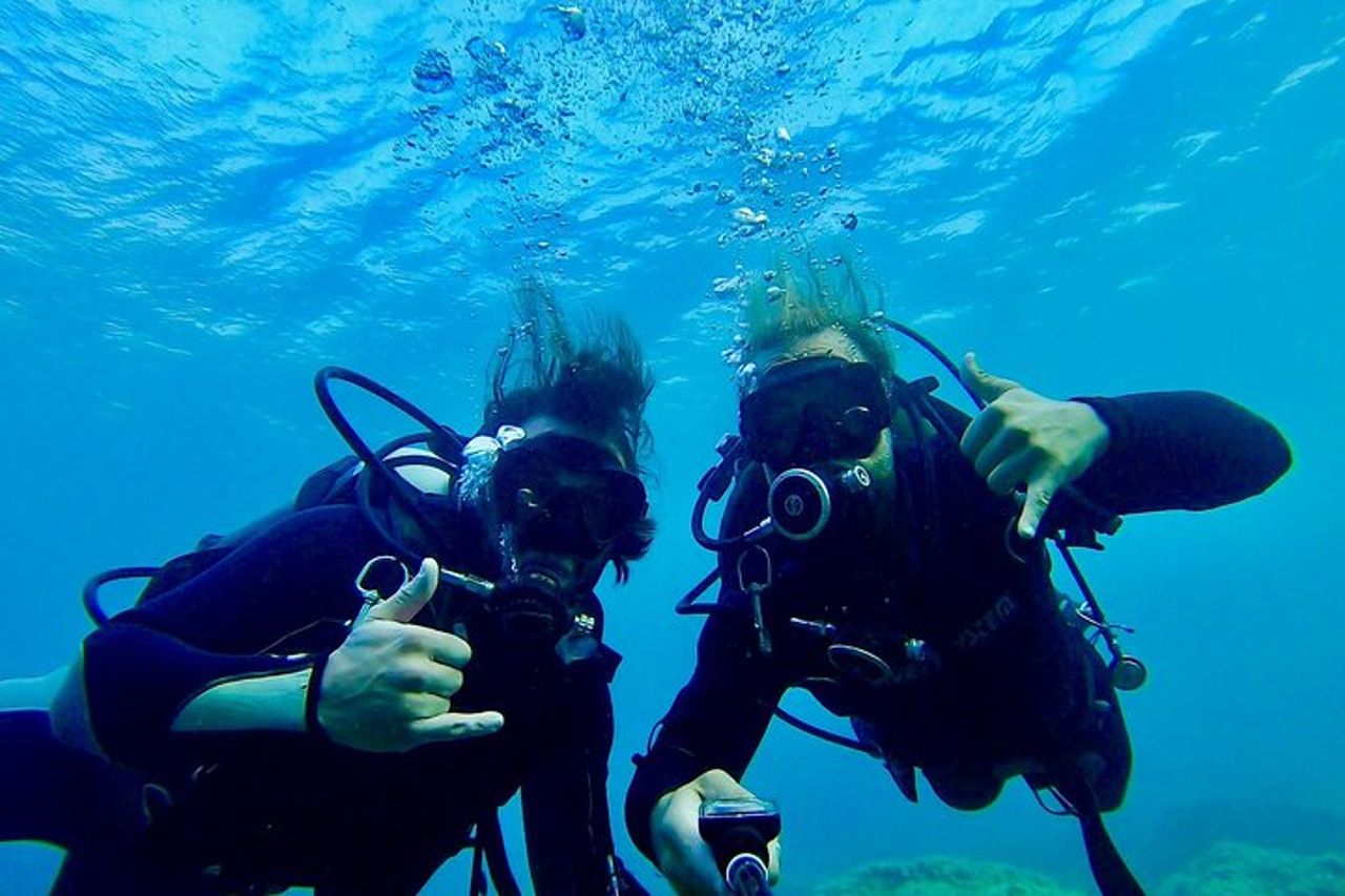 "Battesimo del Mare: Immersione Subacquea all'Isola d'Elba" — 2