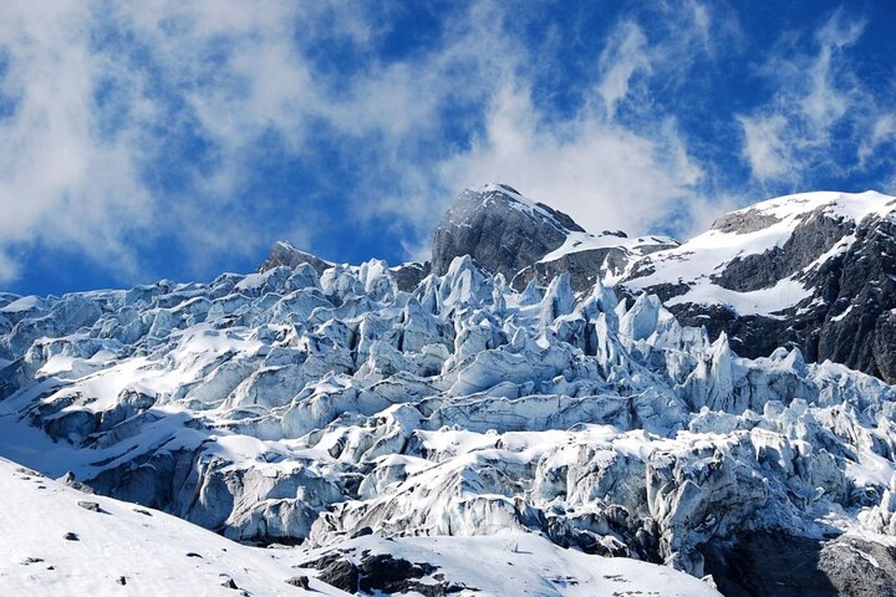 In treno ad alta velocità da Kunming alla montagna innevata del Drago di Giada di Lijiang — 6